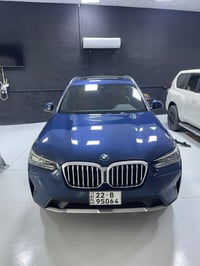 bmw 2023 x3 ماشية 51 الف كيلوا   حادث جاملغ خلفي مع باب خلفي  صبغ 3 قط...