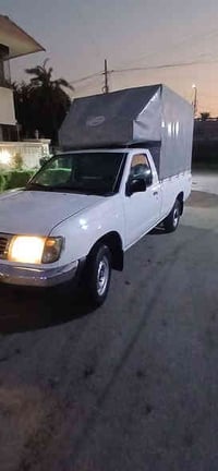 بيكم نيسان ياباني 2002 مشروع وطني رقم بغداد انكليزي  مكفولة من ضربة وا...