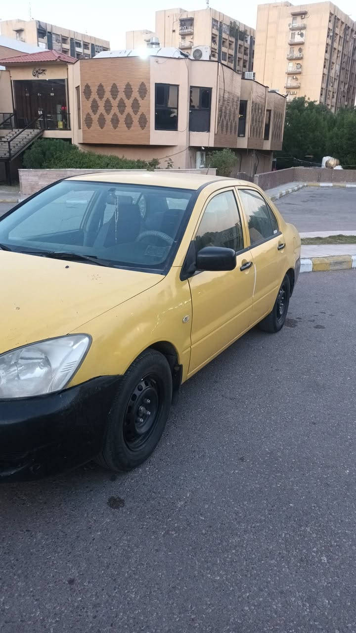 لانسر موديل ٢٠١٠ جاهزه من كلشي سعر ٧٠ مكان بسمايه ***********

