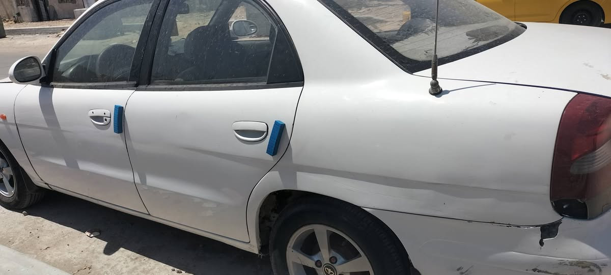 نوبرا 2 موديل 2001 بأسمي محرك جديد مفتوح كهربائيات كله شغاله كيجات واضويه صدر كلش نظيف دواخل بلاديه نظيف بدون ضربه ولا تبديل مصبوغه عام جماليه تخم تايرات رقم انكليزي جاهزه من كلشي نقصه الكير اوتو عاطل تمشي بس على البك ماعندي مجال اوديهه للتصليح ابيع على عطله السعر 26 وبيه مجال للطيبين للأتصال *********** مكان السياره بغداد مدينة الصدر

