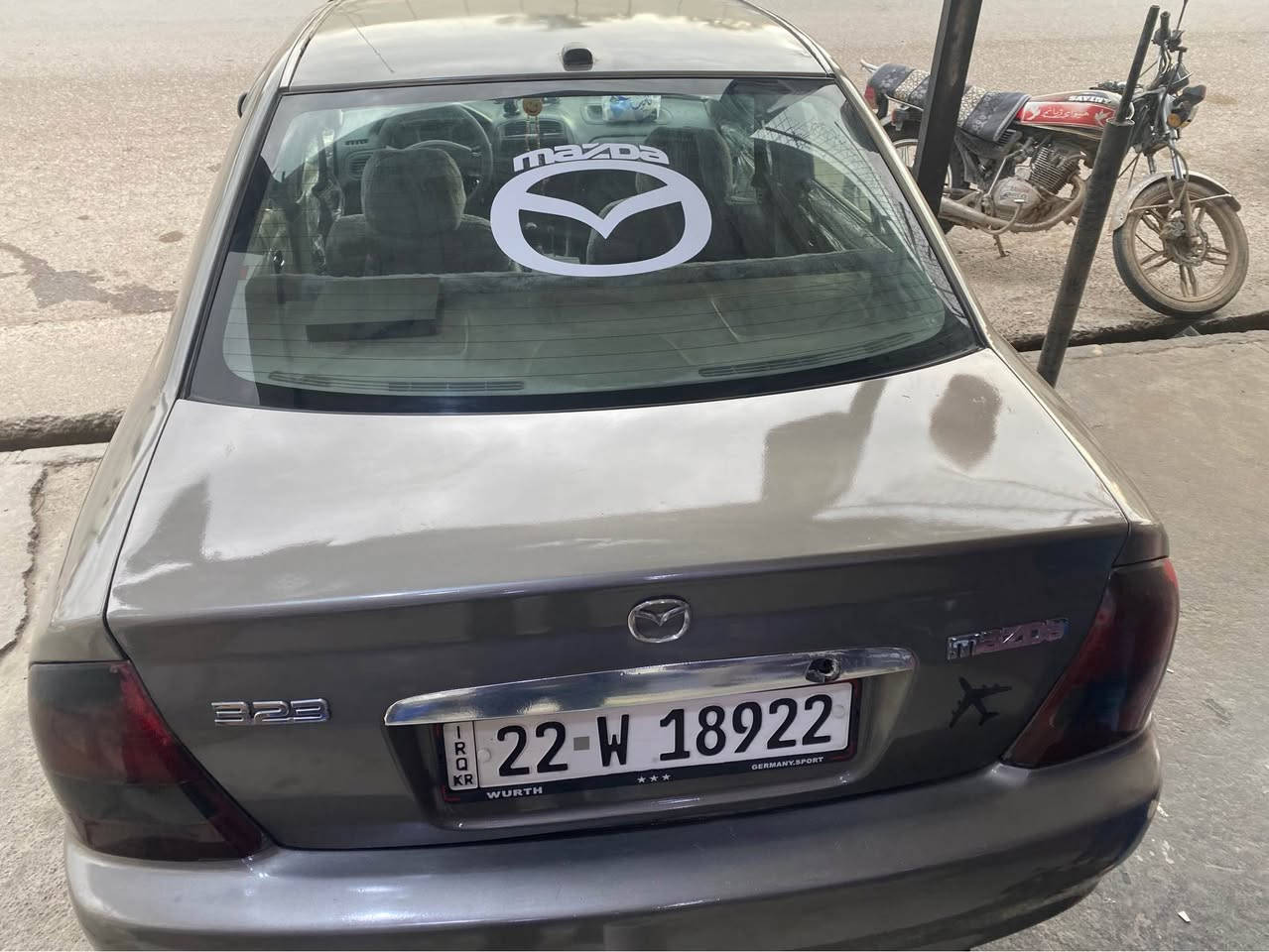 مازدە ٣٢٣ گێر حەدی مودیڵ ٢٠٠١ سنەوی نۆیە تە ٢٠٢٨ گێر و مەکینە بە شەرت خەرامەی لە سەر نیە بە ناوی خۆمە بە شەرتی تەحویڵ  تکسیە کرایتە قصۆسی *********** Singapore
