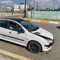 بيجو فرنسي,, 206 گير عادي  رقم بغداد سنوية 2028 كهربائيات شغالة الداخل...