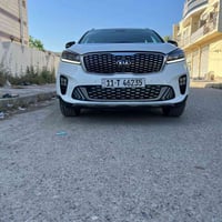 كيا سورنتو خليجي  رقم بغداد الماني بسمي  موديل ٢٠٢٠ شكل ال٢٠  لون ابيض...