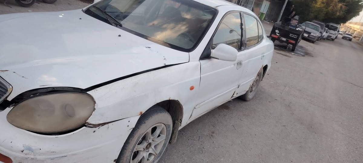 سياره دايو لمنز موديل 1999 رقم ذي قار مشروع وطني كير اوتو كورلا المحرك بداية تبخير السعر 18 ورقة الاتصال على الرقم ***********
