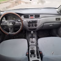 لانسر • ٢٠١٠ • كويسينجاك