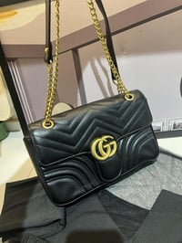 حقيبة كوتشي • مختوم