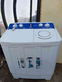 غسالات غسل وتنشيف ثنينهن  وبيبان اثنين تزمام تضافه كدام  عينك رقم الها...