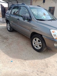 كيه اسبورتج 2008 وارد امريكي مكينه6 سعر 100 بيه بنيد صبغ 07722049116