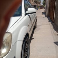 كيا ريو2008خليجي مكينه ١٦٠٠ السعر ٦٥ مكان بغداد الرقم 07730111554