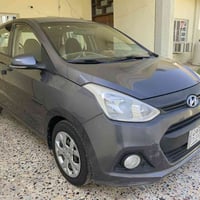 هونداي i10كراند ٢٠١٥ ماشيه ٦٦ الف رقم بغداد بااسمي محرك ١٢٠٠ طخه خفيفه...