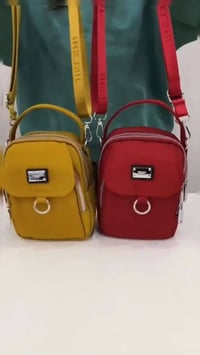 جنطة نايلون • مقاومة للماء • متعددة الجيوب