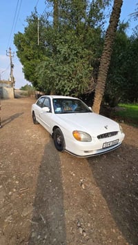 عندي سوناته وفوذ موديل 2000 لبيع بأسمي رقم بغداد انكليزي مكينه 2000 تب...