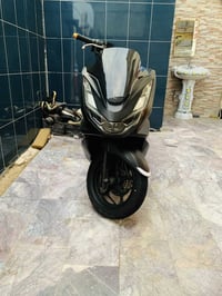 PCX الـجـيـل الـرابـع كوري   كفااالة عامة  ABS  يدات هيتر   جهاز انذار...