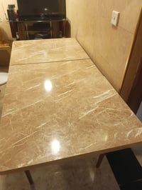 ميز طعام • يتكبر ويتصغر