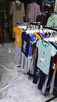 نجف حي الميلاد • ملابس نسائية • ملابس أطفال