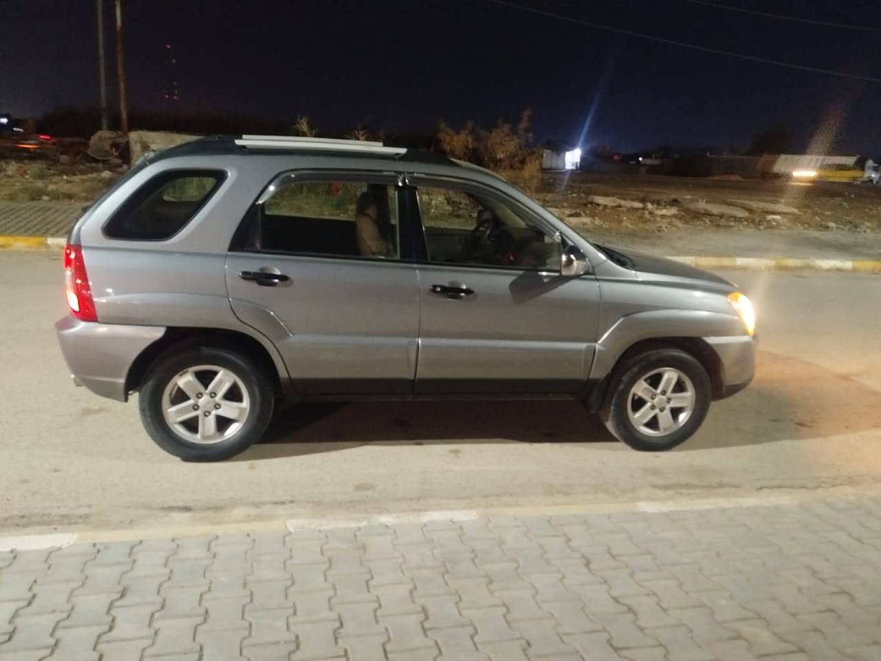 السلام عليكم سبورتج 2009  رقم بغداد كفالة السونار مرفق بالمنشور السعر 120 مكان  السيارة كوت ***********
