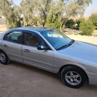 اوبتما • ٢٠٠٢ • كير عادي