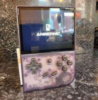 اتاري • Anbernic RG35XX • رام ٦٤