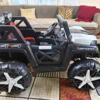 سيارة اطفال شحن كهرباء وبيها ريمون تحكم هذا رقمي 07735893287