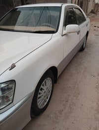 موديل ٢٠٠٠ • رقم نجف دولي • تسجيل جديد