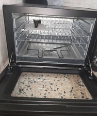 اوفن مستعمل مرتين فقط حجم 60 لتر كبير مكاني وزيرية سعر 90 الف 07736102...