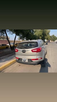 سبورتج 2014 سلوفاكي ماشية 135 الف كيلو  محرك 2000 دوش  رقم بغداد المان...