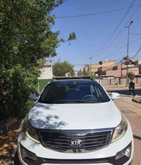للبيع سبورتج رقم بغداد موديل ١٤ ... السيارة نظيفة فول مواصفات  بصمة + ...