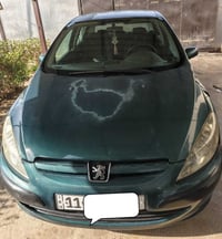سيارة للبيع بيجو فرنسي ٢٠٠٥ رقم بغداد باسمي تحويل ثاني يوم مكفولة بدون...