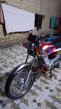 دراجة نارية • موديل 24 • أوراق سكنر