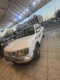 بيكم نيسان 2004  نوزل  هزه سنويه ورقم جديد  سياره كامله مابيه اي نقص م...