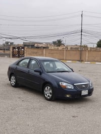 سبكترا 2005 محدثه 9 وارد امريكي رقم بغداد سنويه جديده مصبوغه عام جمالي...