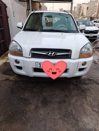 توكسان خليجي موديل ٢٠٠٩ محرك 2700 فور ويل رقم بغداد بأسمي سنوية وهزة ل...