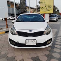 كيا ريو مديل 2013، الون ابيض بسم اخوي رقم نجف السياره خير من لله تبريد...