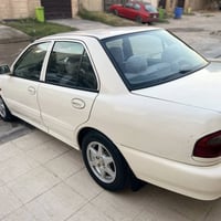 بروتون 2004 كير اوتو ما تيك نظيفة سيارة بلادية دواخلها على وضع الشركة ...