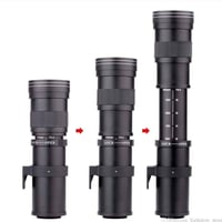 عدسة زوم • كاميرا