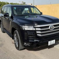 لاند كروز 2022 ساز GXR  توين تيربو رقم بغداد بأسمي السيارة مكفولة كفال...