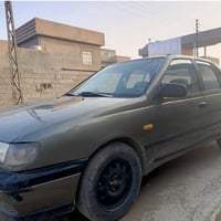 نیسان سنی1992 لدیە دفتربانزین بدون غرامة سعر33