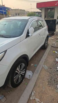 سبورتج للبيع  الموديل/ 2015 المسافة/111000 اللون ابيض بيها ضربة بجانب ...