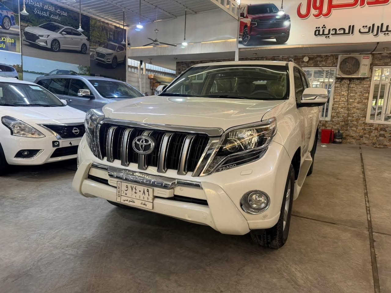 🔷 معرض الإمام المركزي 🔷
📍 العنوان: بغداد – الكريعات – شارع الوقف السني

⸻

🚘 تويوتا برادو 2014 VX
🔹 فول مواصفات – رقم بغداد

المواصفات:
 • بصمة فتح وتشغيل
 • مقاعد جلد
 • كراسي كهرباء
 • تبريد كراسي (أمامية + خلفية)
 • لايت زينون
 • زراك لايت
 • ستيرن كهرباء
 • 6 سلندر
 • محرك 4000
 • 7 ركاب
 • 3 قطع
 • عداد المسافة: 114,000 كم

الحالة:
 • السيارة بيها شخوط خفيفة (غير قوية) جهة عكس السائق
 • بارد بمقدار إصبعين بالبلب، والباقي مكفول

⸻

💰 السعر:315$
✔️ مجال بسيط

⸻

📞 للاستفسار:
***********
***********
