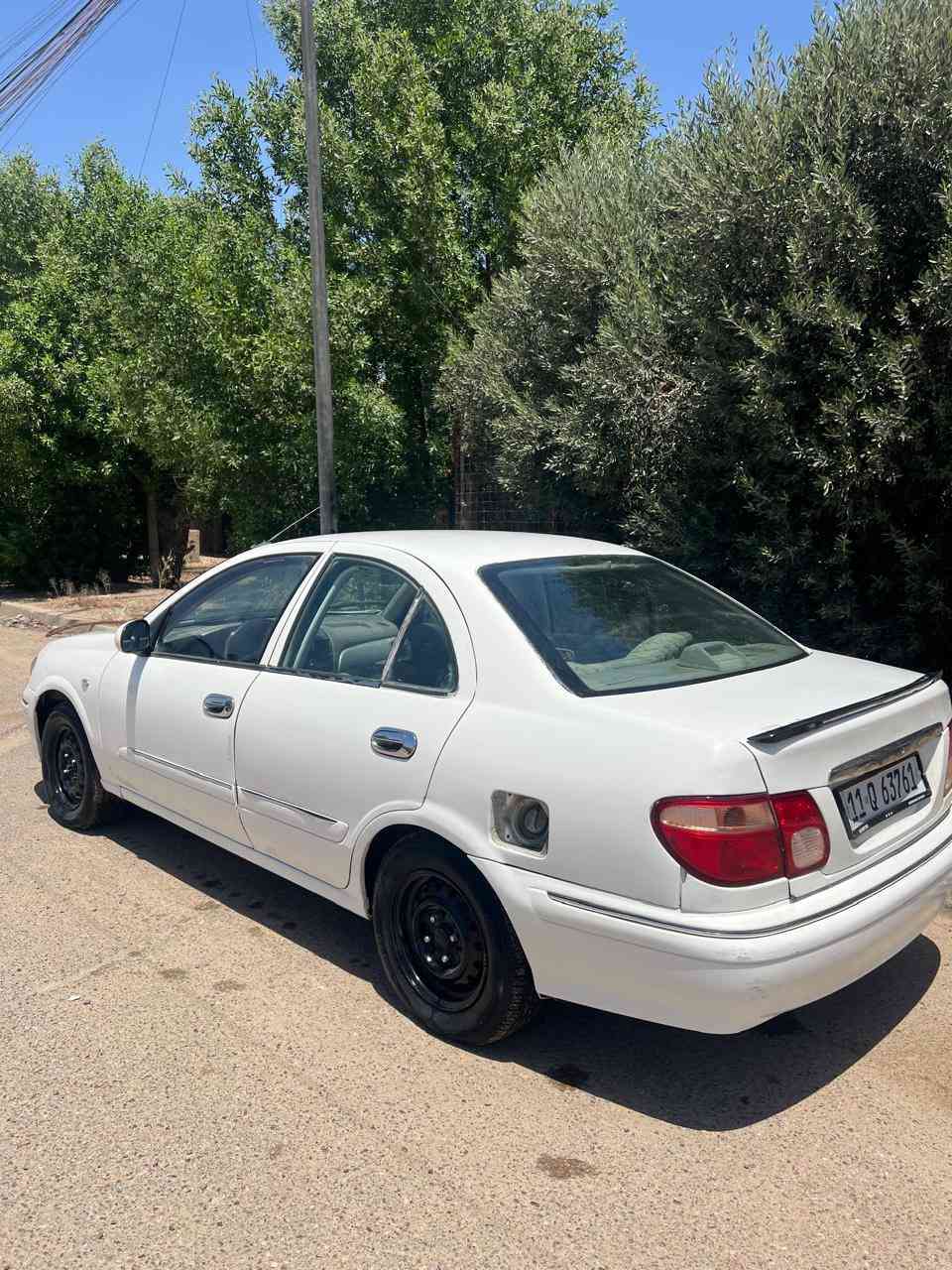 السلام عليكم ورحمة الله وبركاته سني موديل 2002 بسمي ارقام وسنوية وهزه جديده كبل تحويل سيارة مكينه كير تبريد كله شغال وجديد السيارة مصبوغه عام لان جانت صفره ورجعت ابيض السيارة حلوه احلى من الصور بهواي داخلها نظيف جدا السعر 55$وبيها مجال بسيط 
العنوان بغداد المنصور ساحة اللقاء 
التواصل على الرقم ***********
