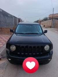 جيب باتريوت موديل 2014 محرك٢٤٠٠    ضربتها جاملغ امامي بدون دواخل   كهر...