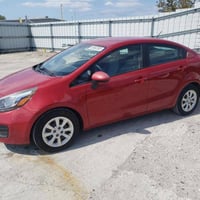 كيا ريو رقم بغداد موديل 2015 وارد امريكي محرك 1600 سنويه رقم هزة جديدة...