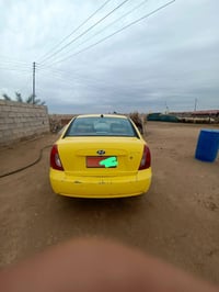 اكسنت تكسي 2011 رقم نينوى  الضرر جاملغ الايسر وطخة خفيفة بالصندوق الخل...