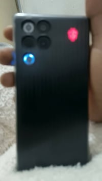 ريد ماجك 11برو  جديد صارله سبوع ذاكره 256 كامل لحقات 950 07752401673