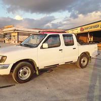 نيسان بيكاب • ٢٠٠١ • كويسينجاك