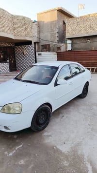 وبتره 2012 بغداد بسمي بيه قطعتين قبق جنطه وجملق مكان محرك 1600 مكان بغ...