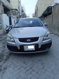كيا ريو موديل 2009 اوتوماتيك أمريكي حادثها جاملغ وبنيد  مبدل محرك وگير...