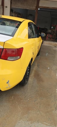 كيا فورتي • ٢٠١٠ • ضرر يمين وصندوق