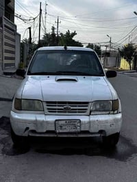 كيا سبور تج ٢٠٠٠مكينة٢٠٠٠كيرومكينة بحالة جيده كهربائي جيده صدر بحالة ج...