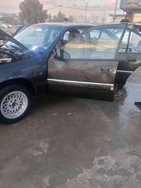 سيارة للبيع اوبل اوميكا حجم 20بدون صبغ وضع بلادي رقم اخضر نينوى كابون ...